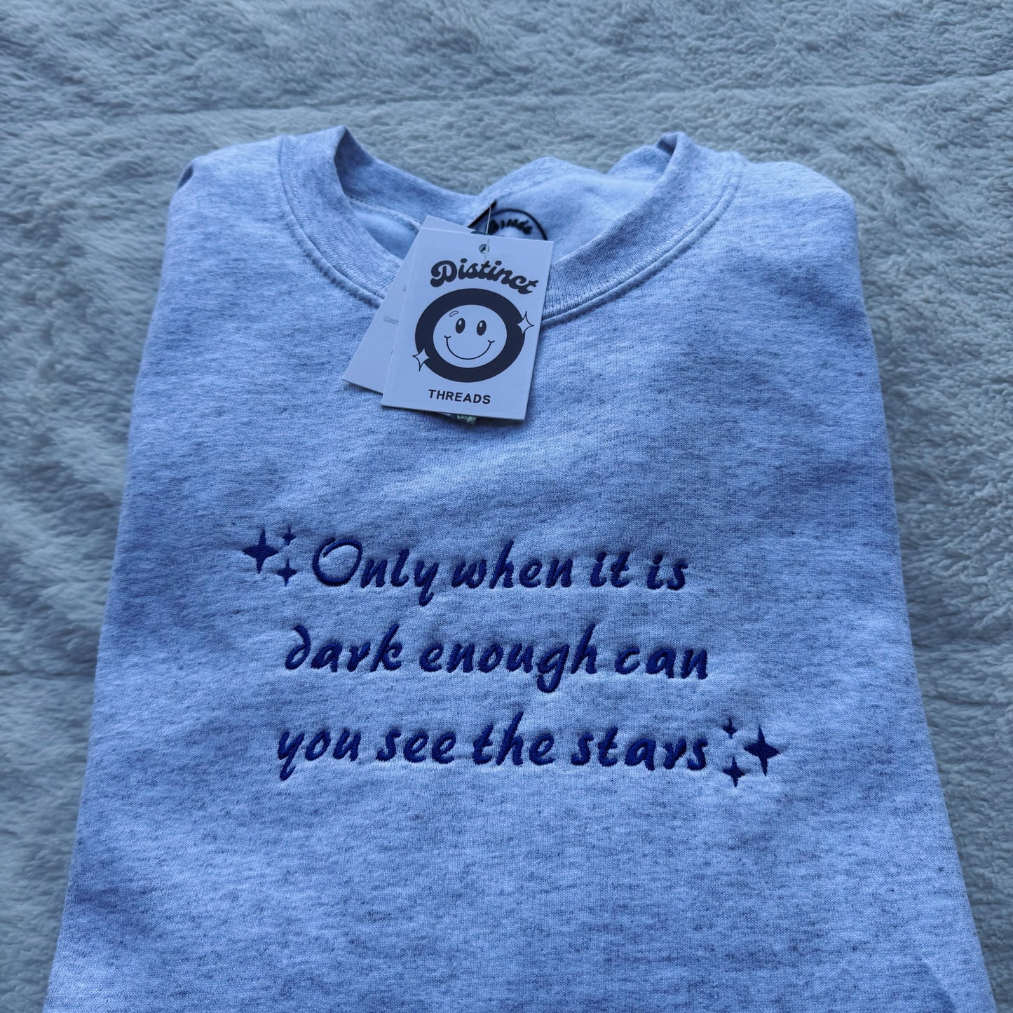 Only When It Is Dark Enough Can You See The Stars Embroidered Crewneck Sweatshirt