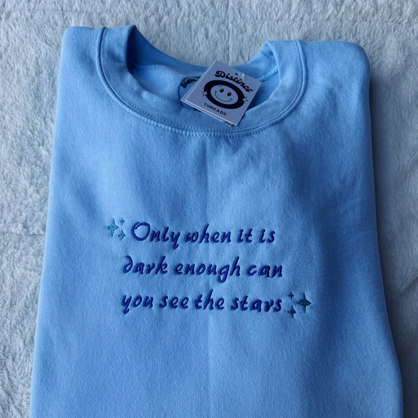 Only When It Is Dark Enough Can You See The Stars Embroidered Crewneck Sweatshirt